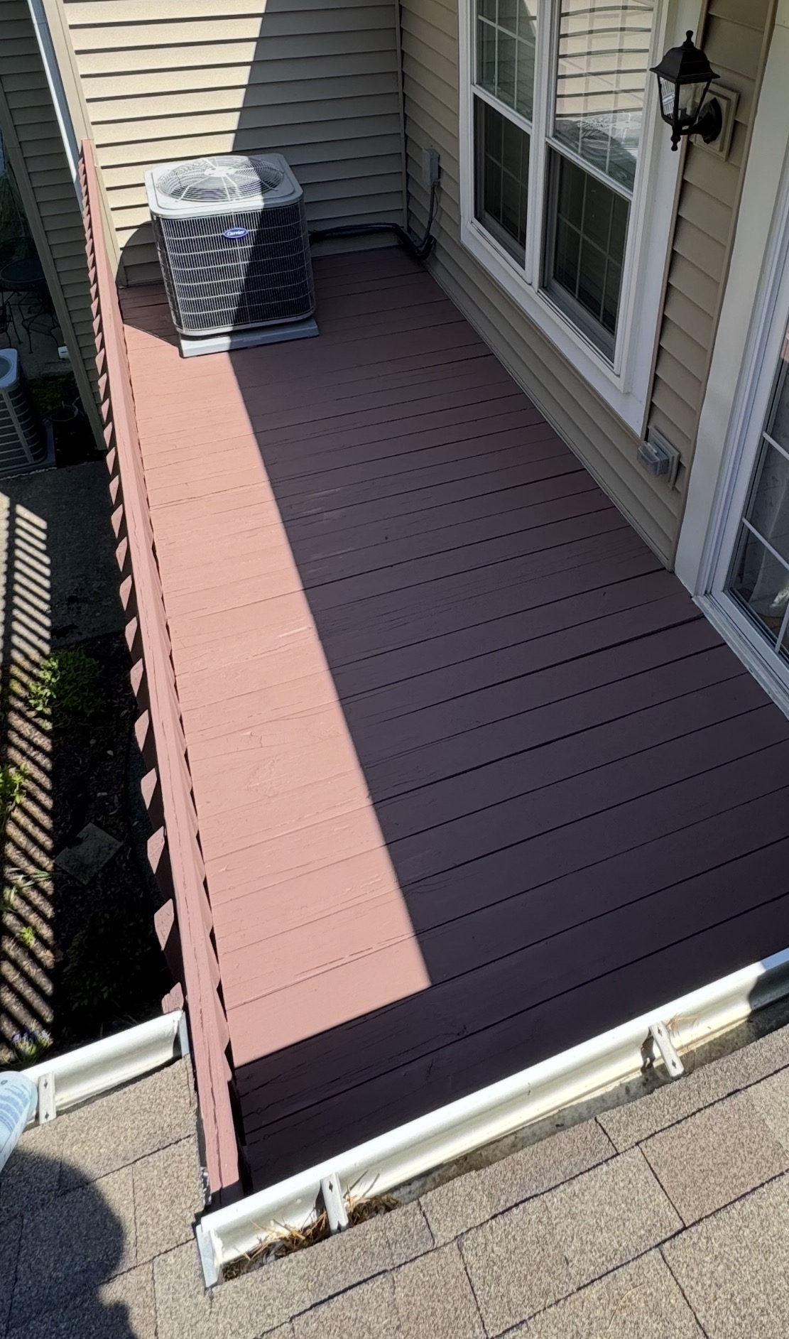 Pressure treated pine deck after — rich brown stain