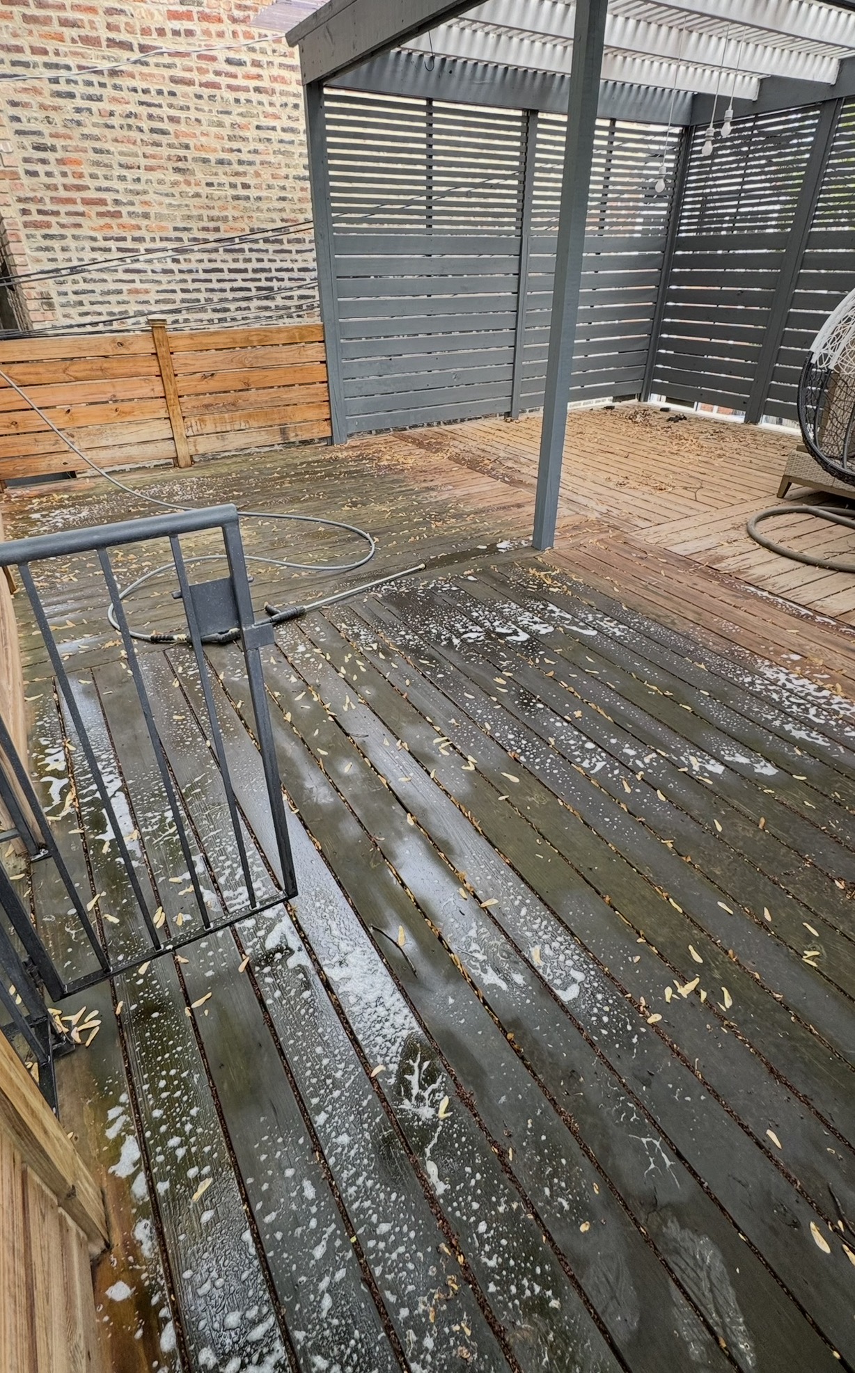 Large deck before — peeling old stain