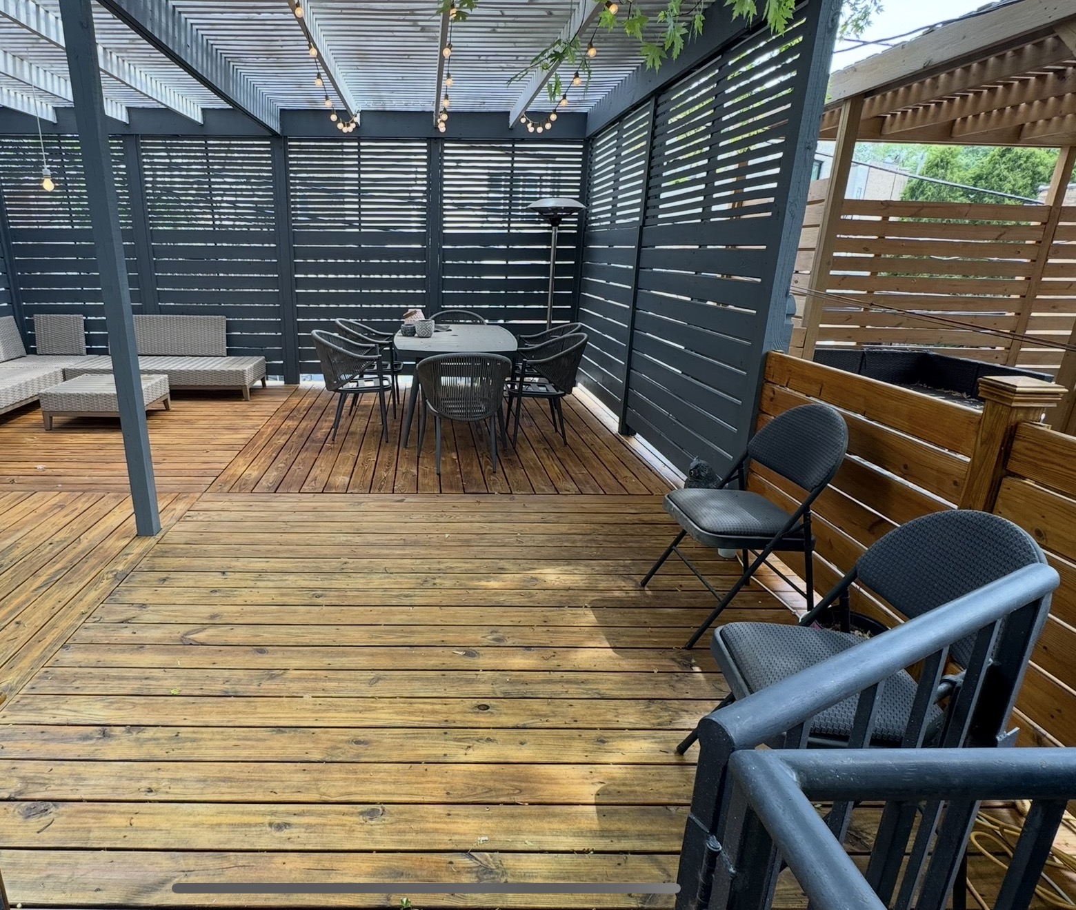 Large deck after — fresh stain and sealed